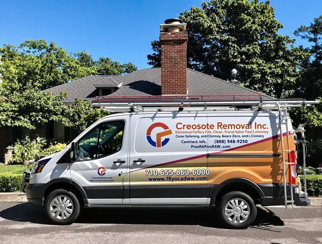 Monroe Chimney Sweep technician removing creosote safely in Monroe, CT